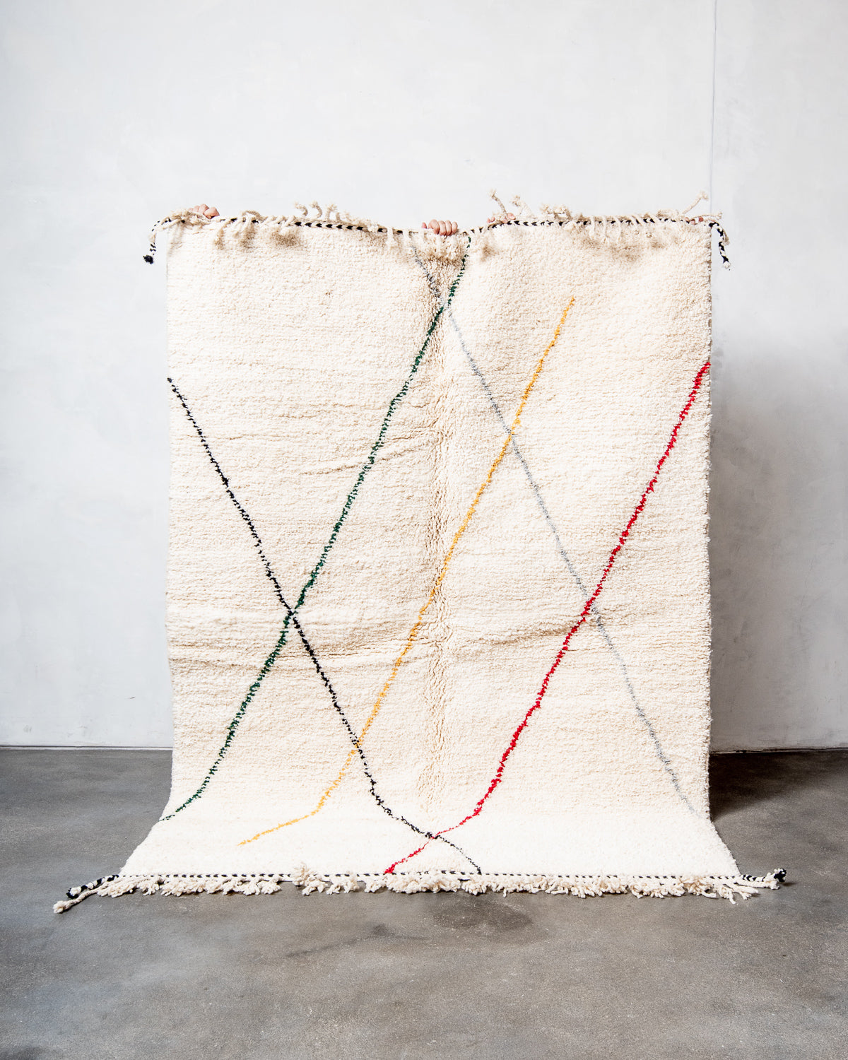 Modern, designer, handcrafted Berber rug from Morocco. Beniourain carpet with beautiful colours and patterns and fluffy wool texture.